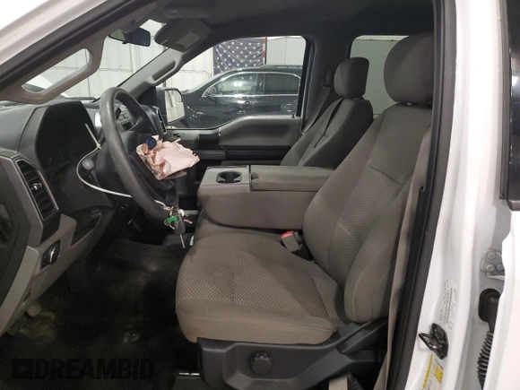 2018 Ford F-150 XL with VIN 1FTEW1E51JKD25812, listed as a Copart auction lot 58729825 with 136,031 mi miles and Salvage title. Bid and sale history available at DreamBid. Image 7.