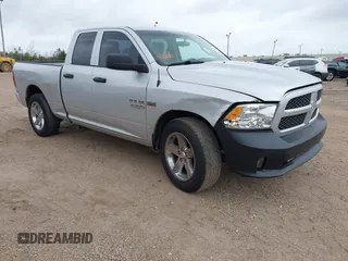 2014 Ram 1500 Tradesman with VIN 1C6RR6FT0ES185042, listed as a IAAI auction lot 41395604 with 159,932 mi miles and . Bid and sale history available at DreamBid. Image 1.