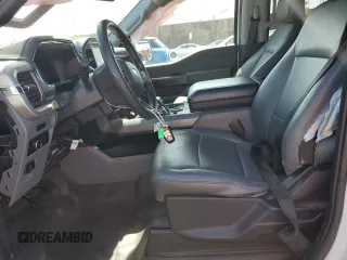 2023 Ford F-150 Lightning Pro с VIN 1FTVW1EL2PWG13712, выставлен на аукционе Copart как лот 56950955 с пробегом 60 605 миль миль и Списание • Salvage title. История ставок и продаж доступна на DreamBid. Изображение 7.