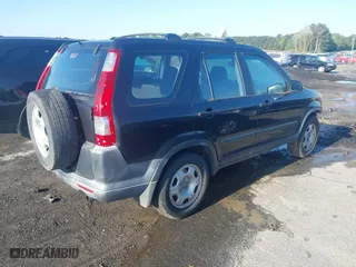 2005 Honda CR-V LX with VIN JHLRD68555C014550, listed as a IAAI auction lot 41986080 with 263,617 mi miles. Bid and sale history available at carsss.com. Image 4.