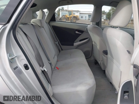 2011 Toyota Prius I z VIN JTDKN3DU6B0321701, wystawiony jako IAAI lot #41631688 z przebiegiem 127 987 mil mil oraz . Historia ofert i sprzedaży dostępna na DreamBid. Obrazek 8.