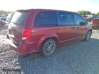 2014 Dodge Grand Caravan SE with VIN 2C4RDGBG5ER376866, listed as a IAAI auction lot 42022978 with 108,037 mi miles. Bid and sale history available at carsss.com. Image 4.