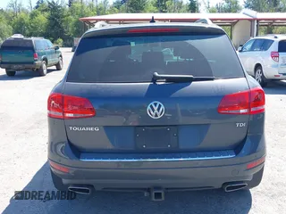 2012 Volkswagen Touareg Sport with VIN WVGFK9BP0CD004951, listed as a IAAI auction lot 42724125 with 173,993 mi miles and . Bid and sale history available at DreamBid. Image 16.