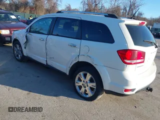 2013 Dodge Journey Crew with VIN 3C4PDCDG3DT521556, listed as a IAAI auction lot 41852888 with 209,562 mi miles and . Bid and sale history available at DreamBid. Image 3.