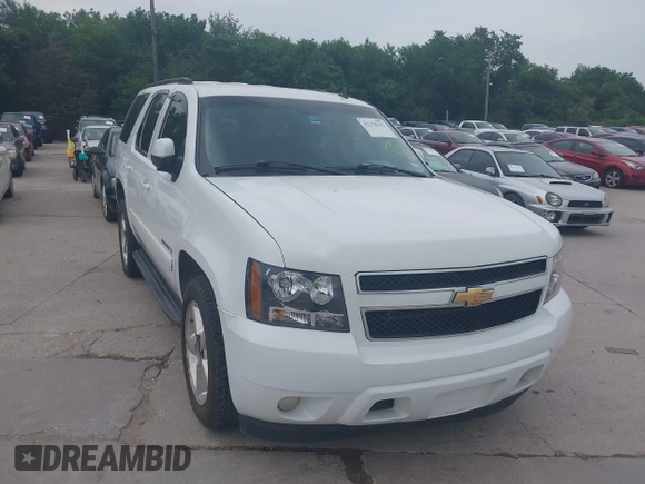 2007 Chevrolet Tahoe LT z VIN 1GNFC13027R112945, wystawiony jako IAAI lot #42178102 z przebiegiem 202 858 mil mil oraz . Historia ofert i sprzedaży dostępna na DreamBid. Obrazek 1.