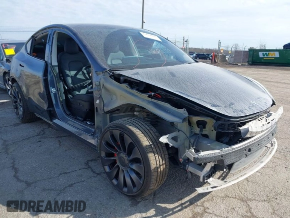 2023 Tesla Model Y Performance with VIN 7SAYGDEF7PF590750, listed as a IAAI auction lot 41694002 with Not Provided miles and . Bid and sale history available at DreamBid. Image 1.