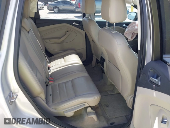 2014 Ford Escape Titanium с VIN 1FMCU0J9XEUB93591, выставлен на аукционе IAAI как лот 41721869 с пробегом 98 859 миль миль и . История ставок и продаж доступна на DreamBid. Изображение 8.