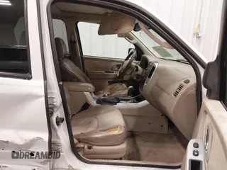 2006 Mercury Mariner Luxury с VIN 4M2YU57116DJ03832, выставлен на аукционе IAAI как лот 41790719 с пробегом 161 978 миль миль и . История ставок и продаж доступна на DreamBid. Изображение 5.