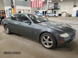 2005 Maserati Quattroporte z VIN ZAMCE39A350017390, wystawiony jako Copart lot #72455664 z przebiegiem 50 394 mil mil oraz Szkoda całkowita • Salvage title. Historia ofert i sprzedaży dostępna na DreamBid. Obrazek 4.