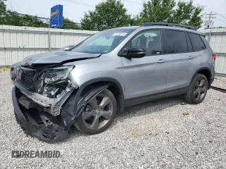 2021 Honda Passport Touring with VIN 5FNYF8H95MB040147, listed as a Copart auction lot 59796975 with 38,699 mi miles and Salvage title. Bid and sale history available at DreamBid. Image 1.