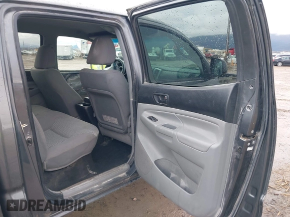 2013 Toyota Tacoma with VIN 3TMLU4EN7DM113315, listed as a IAAI auction lot 41938415 with 228,912 mi miles and . Bid and sale history available at DreamBid. Image 8.