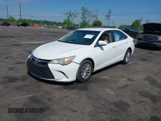2015 Toyota Camry XLE with VIN 4T1BF1FK6FU948938, listed as a IAAI auction lot 42023487 with 107,232 mi miles. Bid and sale history available at carsss.com. Image 2.