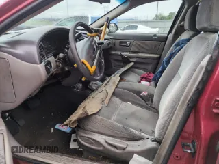 2001 Ford Taurus LX with VIN 1FAFP52UX1A176008, listed as a Copart auction lot 58983935 with 123,985 mi miles and Salvage title. Bid and sale history available at DreamBid. Image 7.