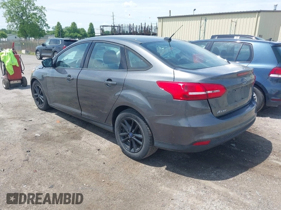 2017 Ford Focus SE with VIN 1FADP3F2XHL235013, listed as a IAAI auction lot 42370565 with 112,276 mi miles and . Bid and sale history available at DreamBid. Image 3.