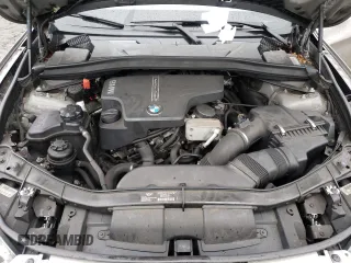 2014 BMW X1 xDrive28i with VIN WBAVL1C52EVY15236, listed as a Copart auction lot 50140885 with 141,088 mi miles and Salvage Title. Bid and sale history available at carsss.com. Image 14.