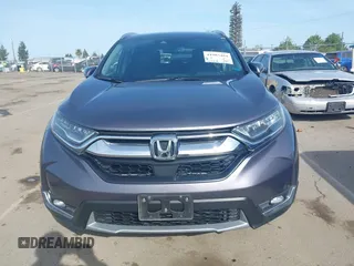 2018 Honda CR-V Touring with VIN 7FARW1H93JE027294, listed as a IAAI auction lot 41903484 with 80,999 mi miles and . Bid and sale history available at DreamBid. Image 13.