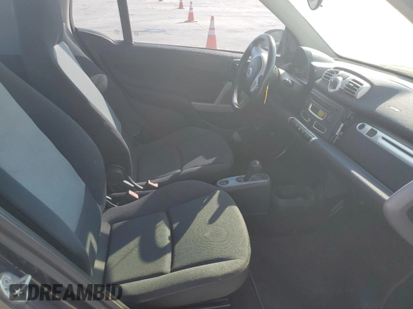 2012 Smart fortwo Pure z VIN WMEEJ3BA5CK540092, wystawiony jako Copart lot #75701964 z przebiegiem 59 355 mil mil oraz Szkody całkowita. Historia ofert i sprzedaży dostępna na DreamBid. Obrazek 10.