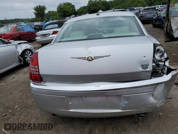 2006 Chrysler 300 C with VIN 2C3LA63H06H527558, listed as a Copart auction lot 64665314 with 74,237 mi miles and Salvage Title. Bid and sale history available at carsss.com. Image 6.