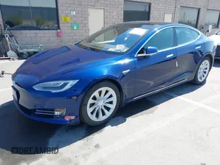 2016 Tesla Model S 90D with VIN 5YJSA1E25GF157220, listed as a IAAI auction lot 42003019 with 130,540 mi miles and . Bid and sale history available at DreamBid. Image 19.