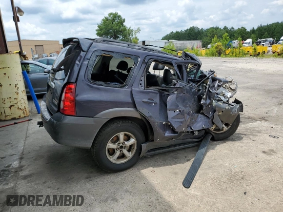 2005 Mazda Tribute S with VIN 4F2CZ06155KM32663, listed as a Copart auction lot 58622554 with 225,000 mi miles and Salvage Title. Bid and sale history available at DreamBid. Image 3.