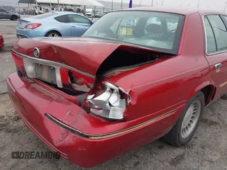 2000 Mercury Grand Marquis LS z VIN 2MEFM75W0YX658319, wystawiony jako IAAI lot #42028736 z przebiegiem 154 651 mil mil oraz . Historia ofert i sprzedaży dostępna na DreamBid. Obrazek 16.
