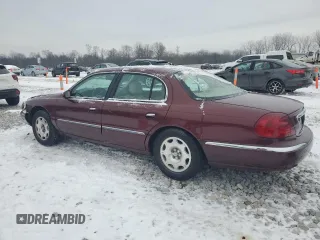 2002 Lincoln Continental with VIN 1LNHM97V62Y684873, listed as a Copart auction lot 87602665 with 52,974 mi miles and Salvage Title. Bid and sale history available at carsss.com. Image 2.