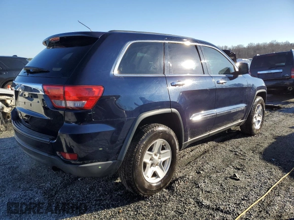2013 Jeep Grand Cherokee Laredo with VIN 1C4RJEAG6DC561496, listed as a Copart auction lot 45977855 with 253,615 mi miles and Salvage Title. Bid and sale history available at carsss.com. Image 3.