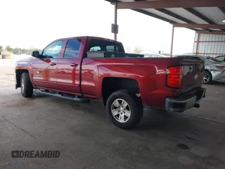 2017 Chevrolet Silverado 1500 LT with VIN 1GCRCRECXHZ241349, listed as a IAAI auction lot 42014523 with 124,703 mi miles and . Bid and sale history available at DreamBid. Image 3.