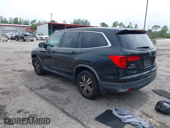 2017 Honda Pilot EX-L with VIN 5FNYF6H50HB033968, listed as a IAAI auction lot 42400720 with 119,597 mi miles and . Bid and sale history available at DreamBid. Image 3.