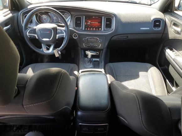 2015 Dodge Charger SXT with VIN 2C3CDXHG8FH794623, listed as a Copart auction lot 52000144 with 145,624 mi miles and Salvage Title. Bid and sale history available at DreamBid. Image 8.