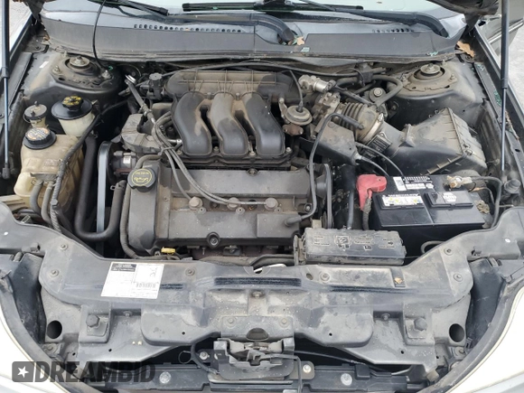 2001 Mercury Sable LS with VIN 1MEHM55SX1G608761, listed as a Copart auction lot 43158475 with 184,120 mi miles and Salvage Title. Bid and sale history available at DreamBid. Image 11.