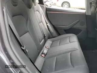 2025 Tesla Model 3 Long Range with VIN 5YJ3E1EAXSF878982, listed as a Copart auction lot 60302315 with 4,312 mi miles and Salvage title. Bid and sale history available at DreamBid. Image 10.