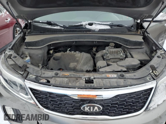2014 Kia Sorento LX z VIN 5XYKT3A63EG470187, wystawiony jako Copart lot #88716075 z przebiegiem 111 478 mil mil oraz Szkoda całkowita • Salvage title. Historia ofert i sprzedaży dostępna na DreamBid. Obrazek 12.
