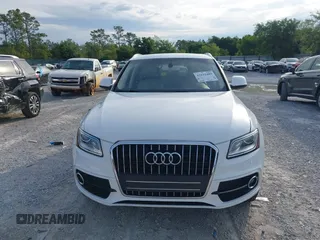 2015 Audi Q5 Premium Plus z VIN WA1DGAFPXFA054099, wystawiony jako IAAI lot #42192489 z przebiegiem 106 560 mil mil oraz . Historia ofert i sprzedaży dostępna na DreamBid. Obrazek 13.