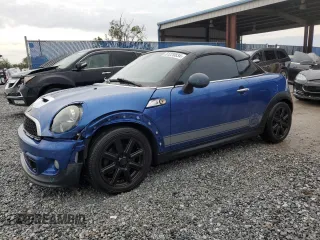 2014 MINI Coupe S z VIN WMWSX3C59ET772948, wystawiony jako Copart lot #81220834 z przebiegiem 99 211 mil mil oraz Szkody całkowita. Historia ofert i sprzedaży dostępna na DreamBid. Obrazek 1.