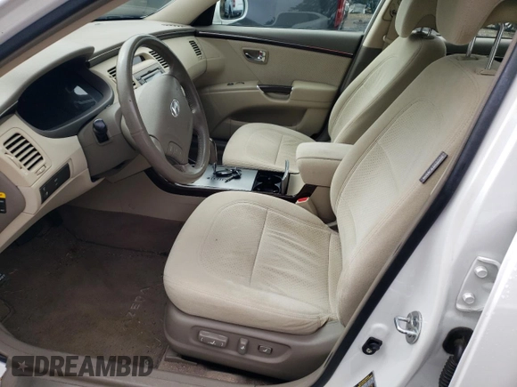 2010 Hyundai Azera GLS z VIN KMHFC4DD4AA513796, wystawiony jako Copart lot #59782965 z przebiegiem 56 958 mil mil oraz Szkoda całkowita • Salvage title. Historia ofert i sprzedaży dostępna na DreamBid. Obrazek 7.