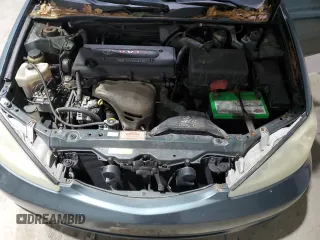2004 Toyota Camry LE z VIN 4T1BE32K74U311882, wystawiony jako Copart lot #47997235 z przebiegiem 205 299 mil mil oraz Szkoda całkowita • Salvage title. Historia ofert i sprzedaży dostępna na DreamBid. Obrazek 11.
