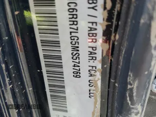 2021 Ram 1500 SLT z VIN 1C6RR7LG5MS574769, wystawiony jako Copart lot #75797744 z przebiegiem Nie podano mil oraz Nie do naprawy • Non repairable. Historia ofert i sprzedaży dostępna na DreamBid. Obrazek 13.