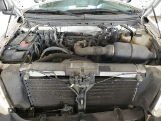 2007 Ford F-150 XL with VIN 1FTRF12297NA82401, listed as a Copart auction lot 58295705 with 198,470 mi miles and Salvage title. Bid and sale history available at DreamBid. Image 11.