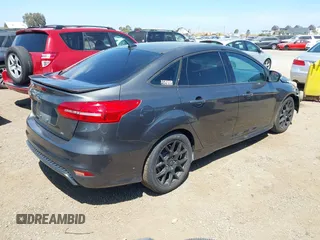 2016 Ford Focus SE with VIN 1FADP3F21GL268058, listed as a IAAI auction lot 42053944 with 103,785 mi miles and . Bid and sale history available at DreamBid. Image 4.