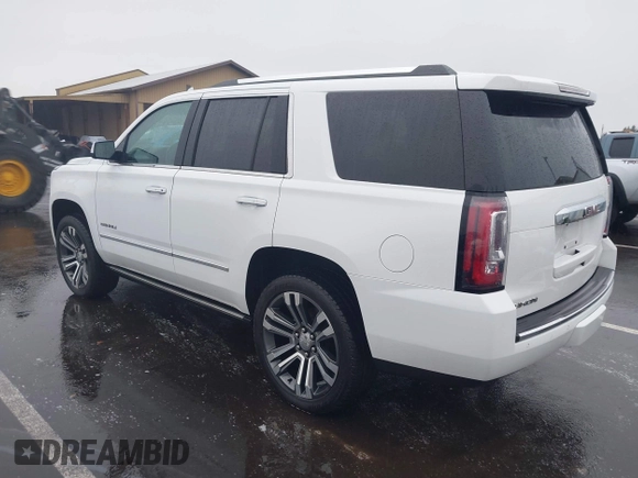 2018 GMC Yukon Denali with VIN 1GKS2CKJ8JR274087, listed as a IAAI auction lot 41097872 with 76,828 mi miles. Bid and sale history available at carsss.com. Image 3.