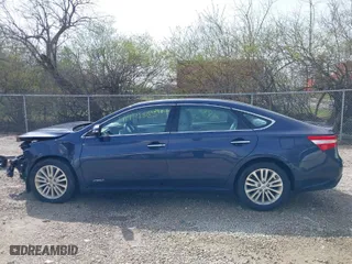 2014 Toyota Avalon Hybrid Limited with VIN 4T1BD1EB5EU024433, listed as a IAAI auction lot 41942865 with 142,377 mi miles. Bid and sale history available at carsss.com. Image 15.