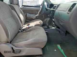 2003 Toyota Tacoma with VIN 5TEVL52N63Z207712, listed as a Copart auction lot 56349545 with 166,194 mi miles and Salvage title. Bid and sale history available at DreamBid. Image 7.