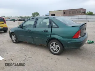 2000 Ford Focus SE z VIN 1FAFP3438YW379761, wystawiony jako Copart lot #58156125 z przebiegiem 103 816 mil mil oraz Szkoda całkowita • Salvage title. Historia ofert i sprzedaży dostępna na DreamBid. Obrazek 2.