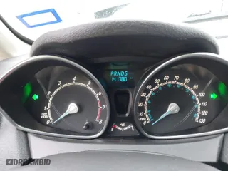2017 Ford Fiesta SE with VIN 3FADP4BJ7HM137543, listed as a IAAI auction lot 41555369 with 141,780 mi miles. Bid and sale history available at carsss.com. Image 7.