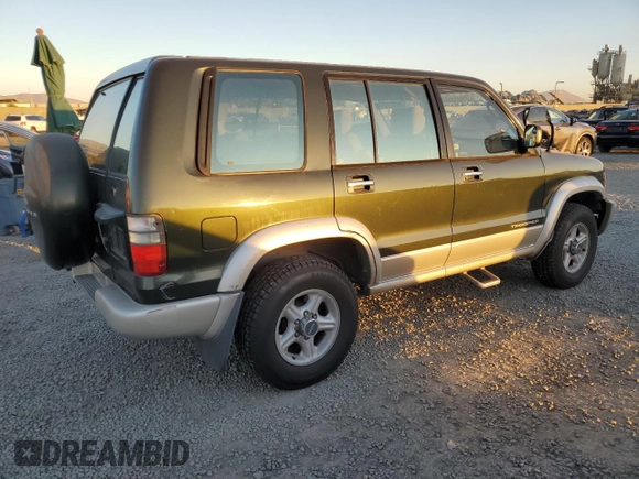 2002 Isuzu Trooper S with VIN JACDJ58X427J08532, listed as a Copart auction lot 84227494 with 166,636 mi miles and Salvage title. Bid and sale history available at DreamBid. Image 3.
