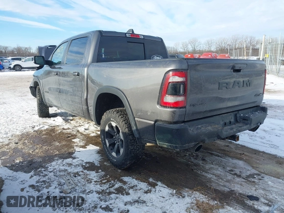 2022 Ram 1500 Rebel z VIN 1C6SRFLT9NN204868, wystawiony jako IAAI lot #41351273 z przebiegiem 67 120 mil mil oraz . Historia ofert i sprzedaży dostępna na DreamBid. Obrazek 3.