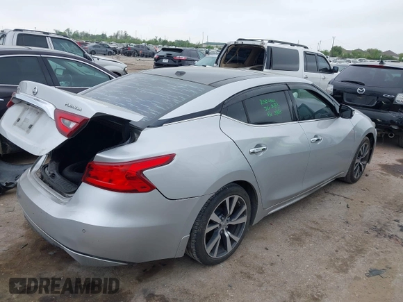 2016 Nissan Maxima SL with VIN 1N4AA6AP2GC386239, listed as a IAAI auction lot 41871290 with 175,941 mi miles and . Bid and sale history available at DreamBid. Image 4.