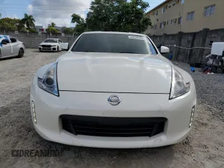 2014 Nissan 370Z Touring with VIN JN1AZ4EH6EM630690, listed as a Copart auction lot 43939795 with 66,797 mi miles and Salvage Title. Bid and sale history available at carsss.com. Image 5.