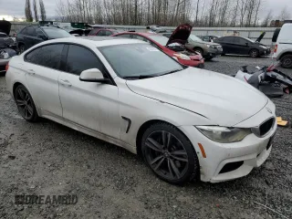 2015 BMW 4 Series 435i xDrive with VIN WBA4B3C56FD669599, listed as a Copart auction lot 43461545 with 186,082 mi miles and Salvage title. Bid and sale history available at DreamBid. Image 4.